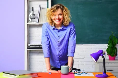 Learning, education and knowledge concept. Teacher job. Portrait of smiling.. Stock Photos