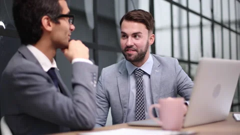 Learning from experience. Cropped shot of two corporate business colleagues Stock Footage 237729233