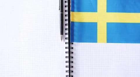 Learning foreign languages. Notepad for entries and a flag. Lang Foto stock