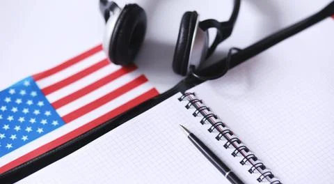 Learning foreign languages. Notepad for entries and a flag. Lang Foto stock