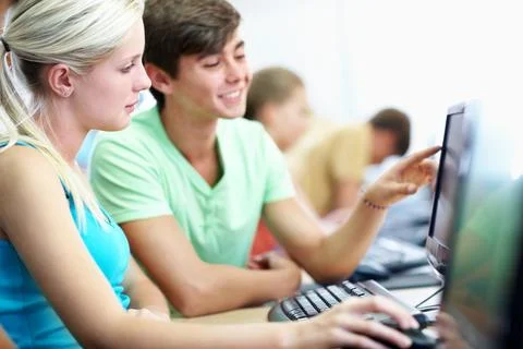 Learning, help and teen with computer at class with friends for knowledge, .. 库存照片