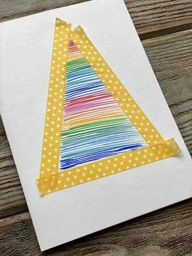Learning how to draw a rainbow Christmas tree, kids DIY. Stock Photos