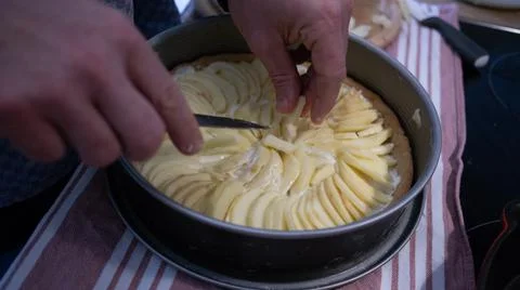 Learning how to make an apple cake during lockdown Stock Photos
