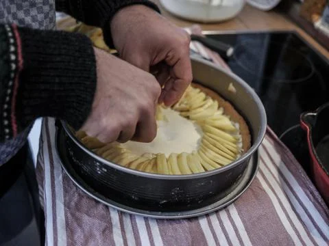 Learning how to make an apple cake during lockdown Stock Photos