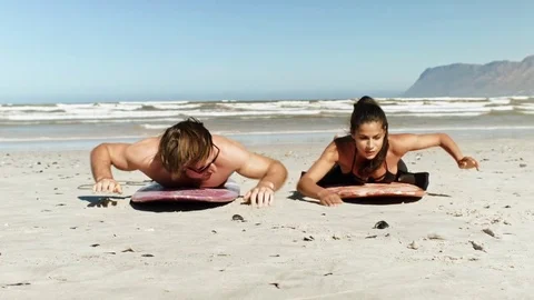 Learning how to surf by ocean Video stock 76521961