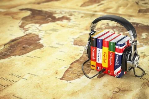 Learning languages online. Audiobooks concept. Books and headphones on the ma Stock Illustration