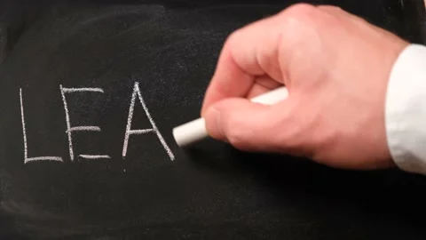 Learning lettering on blackboard Stock Footage 220168708