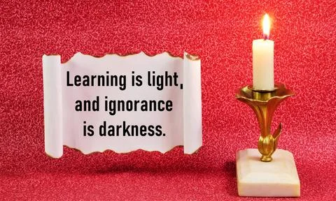 Learning is light, and ignorance is darkness. Stock Photos