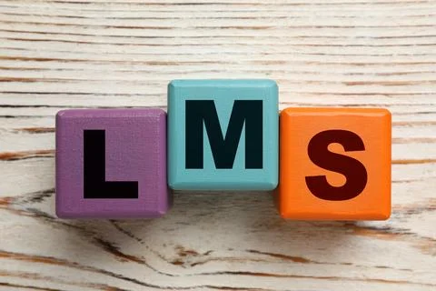 Learning management system. Colorful cubes with abbreviation LMS on wooden .. Stock Photos