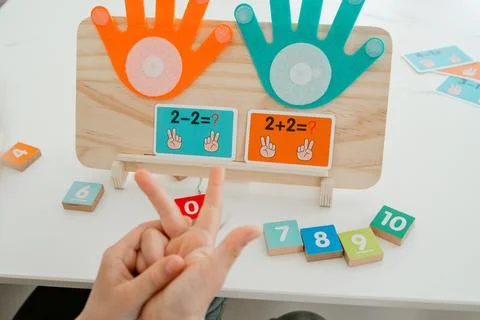 Learning math with fingers Stock Photos