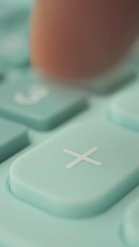 Learning math with a green calculator in close view Stock Footage 326081056