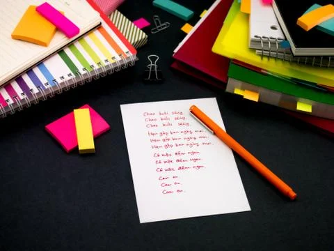 Learning New Language Writing Words Many Times on the Notebook; Vietnamese Stock Photos