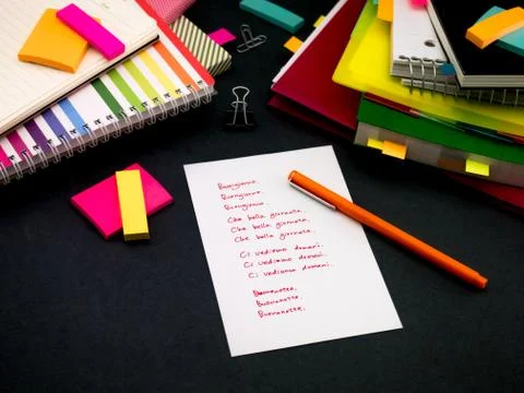 Learning New Language Writing Words Many Times on the Notebook; Italian Stock Photos