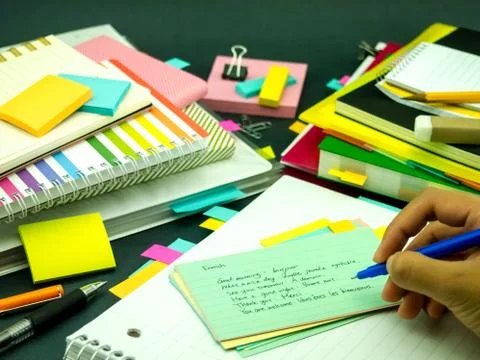Learning New Language Writing Words Many Times on the Notebook; French Stock Photos