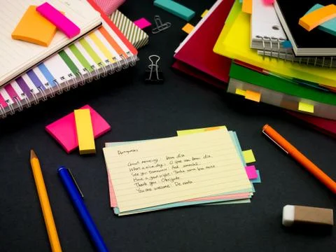 Learning New Language Writing Words Many Times on the Notebook; Portuguese Stock Photos