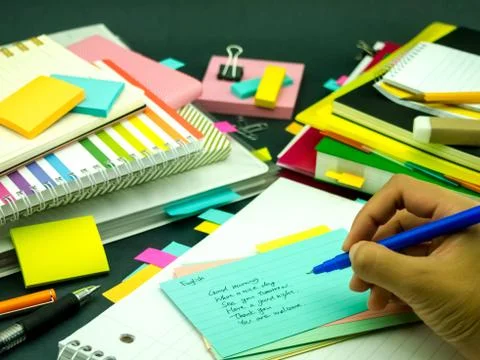 Learning New Language Writing Words Many Times on the Notebook; English Stock Photos