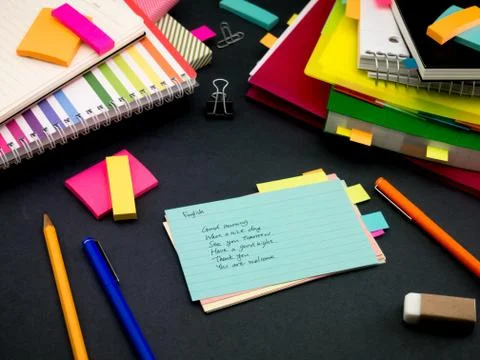 Learning New Language Writing Words Many Times on the Notebook; English Stock Photos