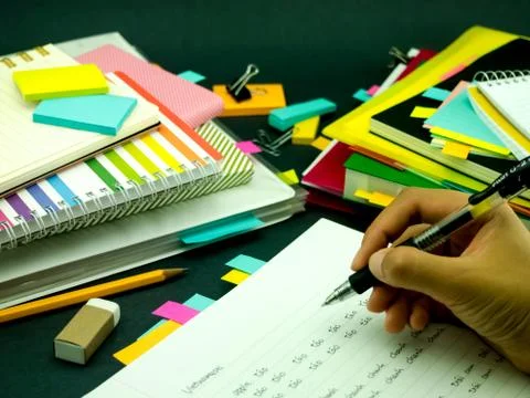 Learning New Language Writing Words Many Times on the Notebook; Vietnamese Stock Photos