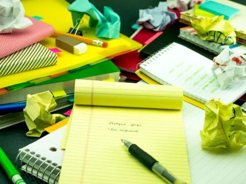 Learning New Language Writing Words Many Times on the Notebook; Russian Foto stock