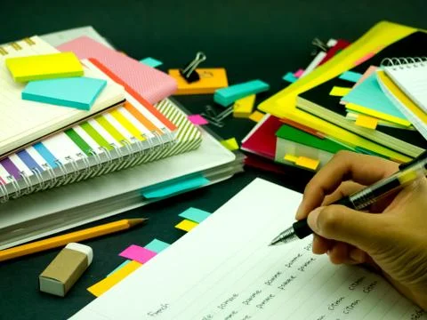 Learning New Language Writing Words Many Times on the Notebook; French Stock Photos