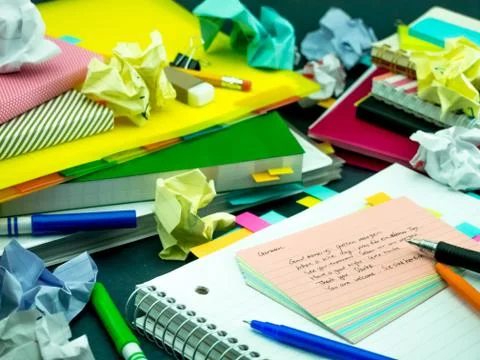 Learning New Language Writing Words Many Times on the Notebook; German Stock Photos