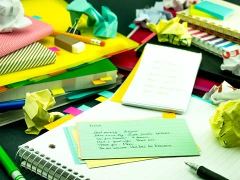 Learning New Language Writing Words Many Times on the Notebook; French Stock Photos