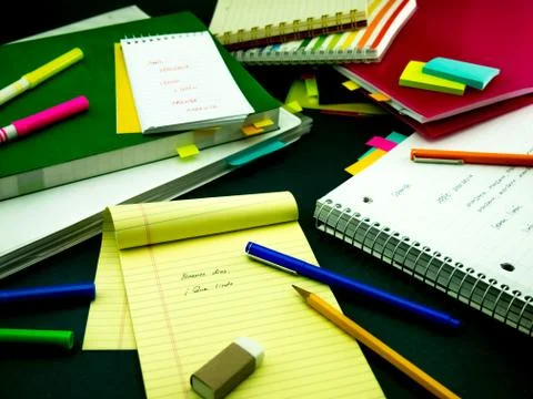 Learning New Language Writing Words Many Times on the Notebook; Spanish Stock Photos