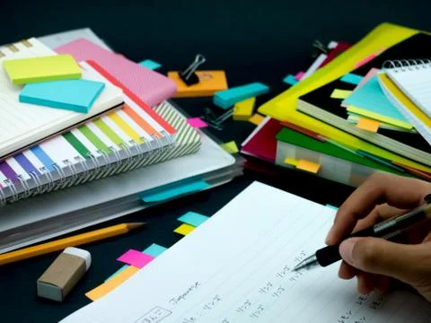 Learning New Language Writing Words Many Times on the Notebook; Japanese Stock Photos