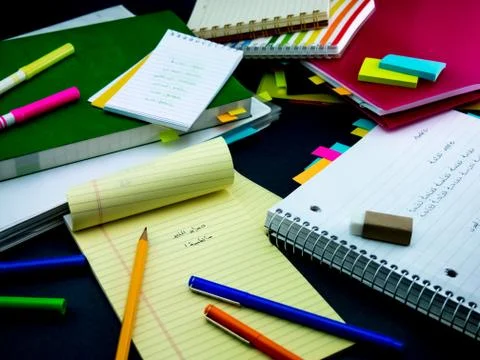 Learning New Language Writing Words Many Times on the Notebook; Arabic Stock Photos