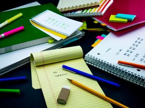 Learning New Language Writing Words Many Times on the Notebook; Mandarin Stock Photos