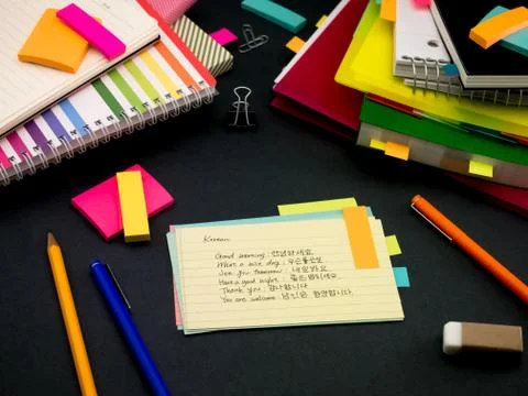 Learning New Language Writing Words Many Times on the Notebook; Korean Stock Photos