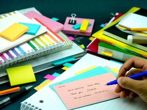 Learning New Language Writing Words Many Times on the Notebook; Polish Stock Photos
