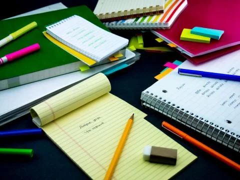Learning New Language Writing Words Many Times on the Notebook; Russian Stock Photos