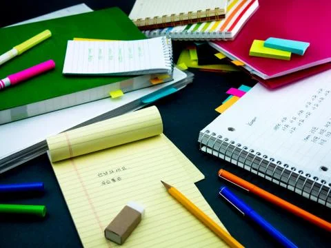 Learning New Language Writing Words Many Times on the Notebook; Korean Stock Photos