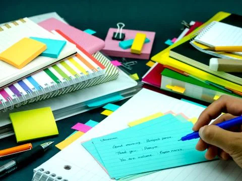 Learning New Language Writing Words Many Times on the Notebook; Ukrainian Stock Photos