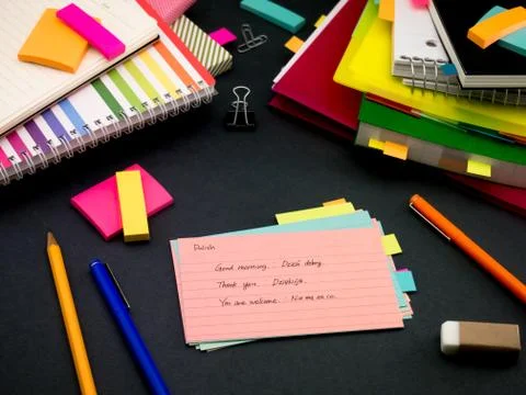 Learning New Language Writing Words Many Times on the Notebook; Polish Stock Photos