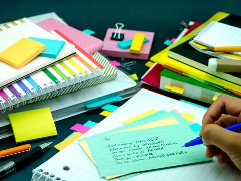 Learning New Language Writing Words Many Times on the Notebook; Thai Stock Photos