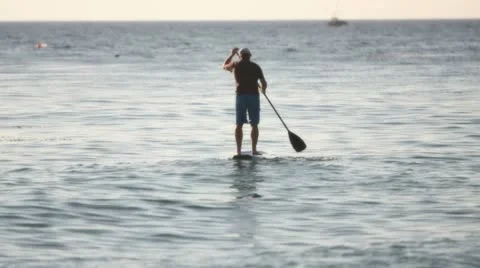 Learning to paddle surf Stock-Footage 11470828