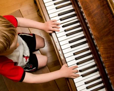 Learning piano Stock Photos