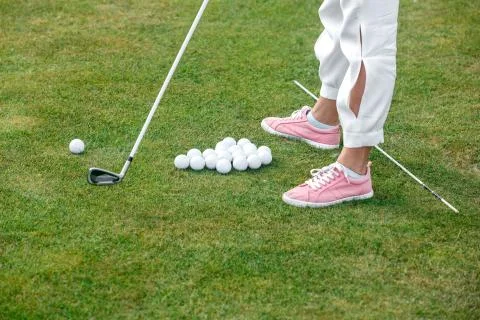 Learning to play Golf. Stock Photos