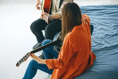 Learning to play the guitar Stock Photos
