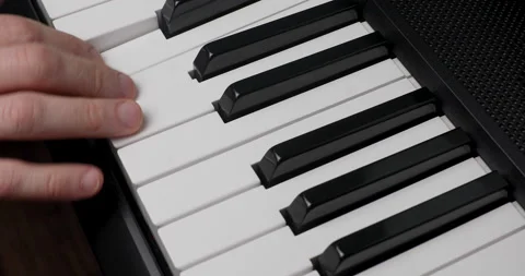 Learning playing piano Stock Footage 156858096