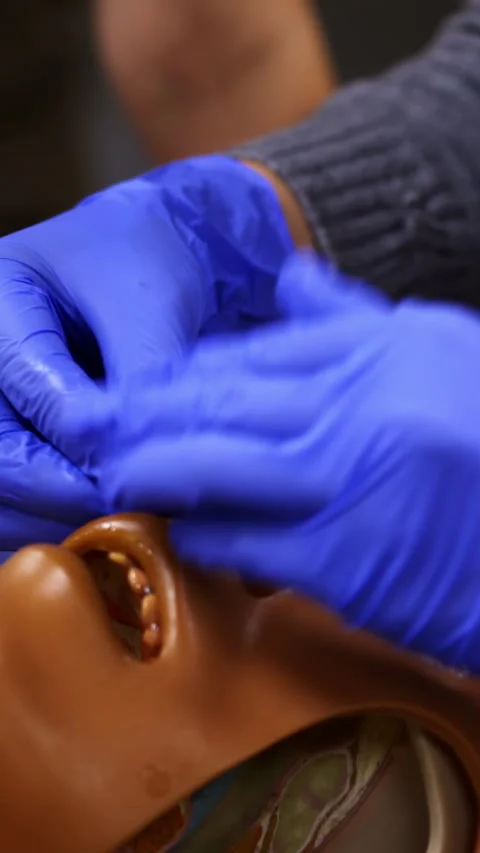 Learning practice on a mannequin Stock Footage 273000075