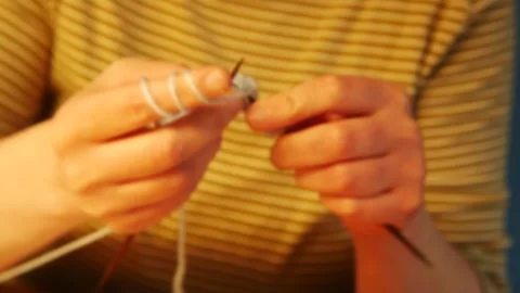 Learning process, fine coordination knitting, Stock Footage 199930284