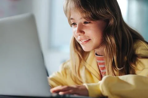 Learning to program like a pro, female student coding with a laptop in class Stock Photos