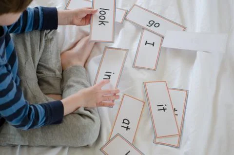 Learning to read with flash cards Stock Photos