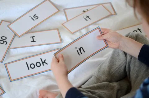 Learning to read with flash cards Stock Photos
