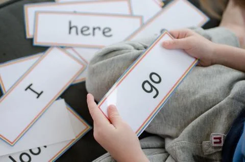 Learning to read with flash cards Stock Photos