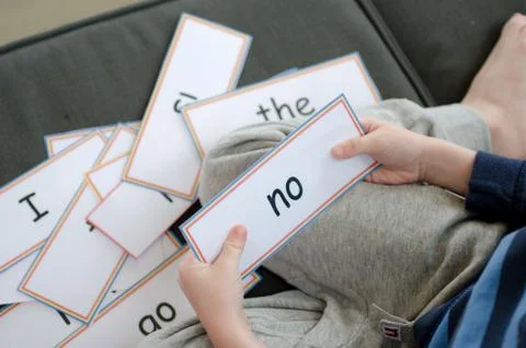 Learning to read with flash cards Stock Photos