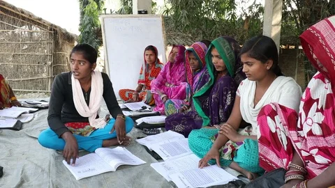Learning to Read in Nepal Stock Footage 73423541